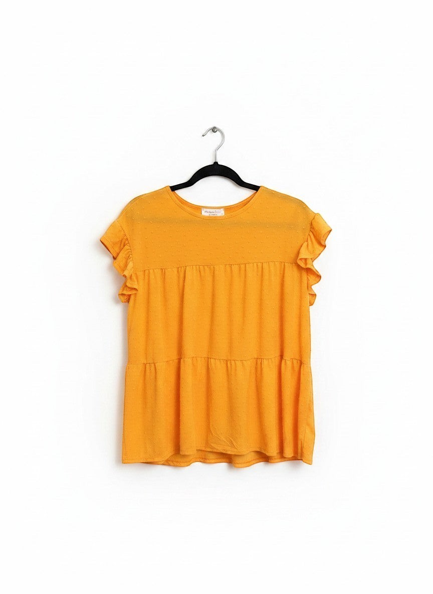 Chic Collective orange peach swiss dot tiered round neck top with cap sleeves.
