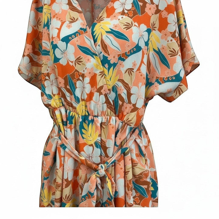 Chic Collective orange tropical print dolman sleeve romper with surplice neckline and tie waist.