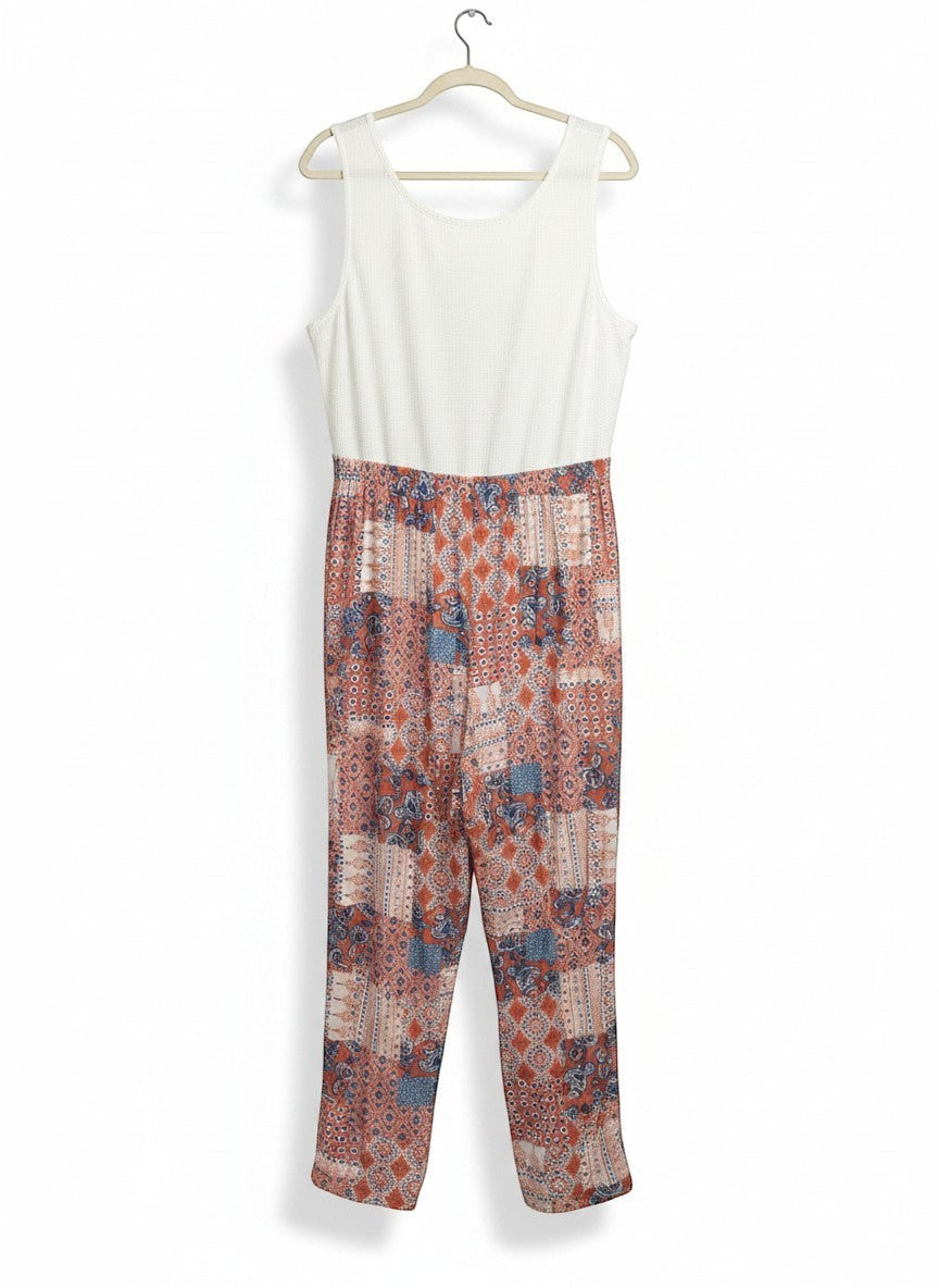 Chic Collective ivory coral vintage patchwork knit jumpsuit with a textured white sleeveless top and patterned pants.