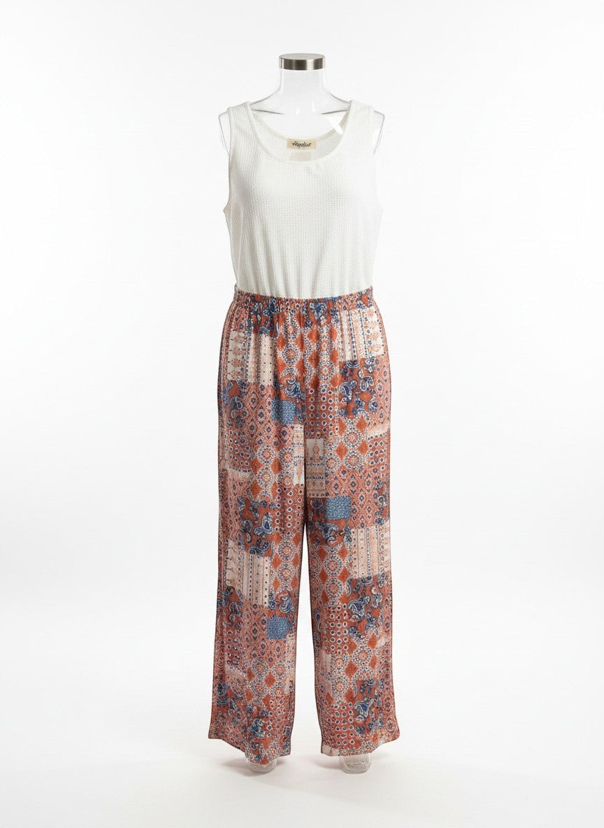 Chic Collective ivory coral vintage patchwork knit jumpsuit with wide-leg pants and a white textured tank top.