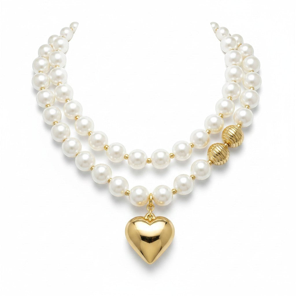 Chic Collective double-strand pearl necklace with gold-tone heart charm and ribbed bead accents.