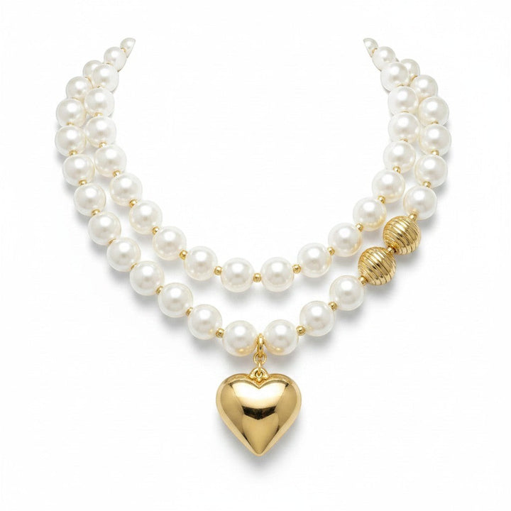 Chic Collective double-strand pearl necklace with gold-tone heart charm and ribbed bead accents.