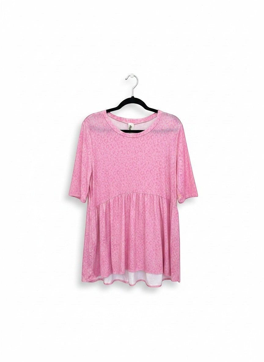 Chic Collective soft pink animal print babydoll top with short sleeves and a gathered waist.