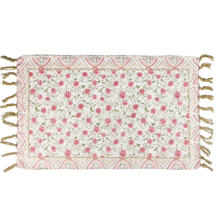 Chic Collective pink floral cotton and chenille rug with tasseled edges and decorative border. Watercolor-style floral pattern.