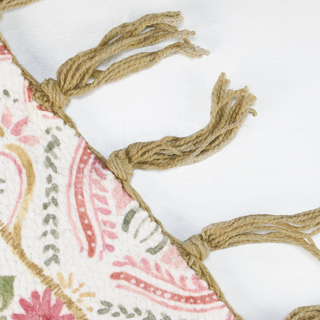 Chic Collective pink floral cotton and chenille rug with tasseled border. Watercolor-style garden design.