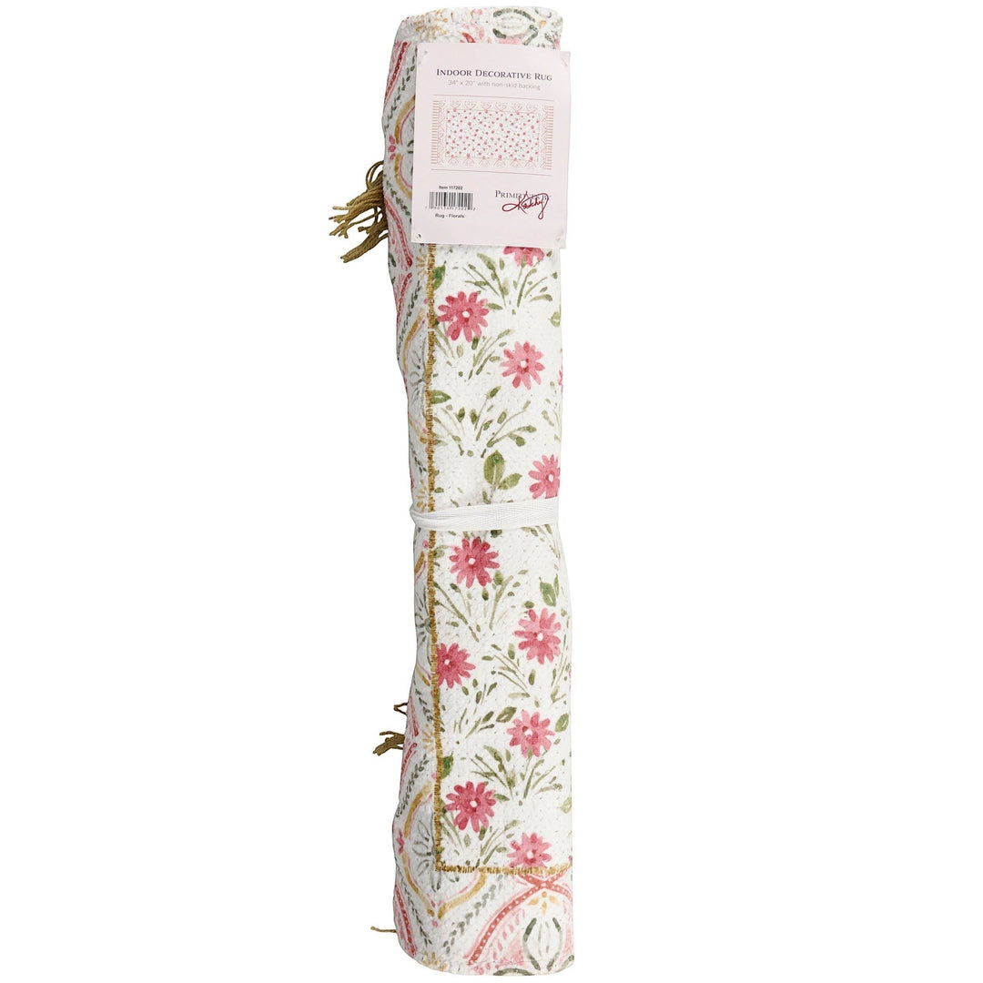 Chic Collective pink floral cotton and chenille rug with coordinating border and tassels. Watercolor design.