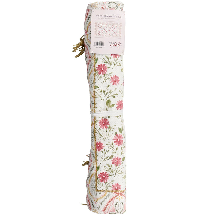 Chic Collective pink floral cotton and chenille rug with coordinating border and tassels. Watercolor design.
