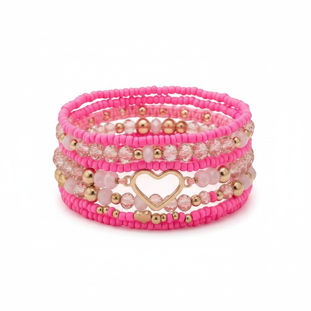 Chic Collective Pink Heart Stack bracelet set with gold accents and clear pink beads.