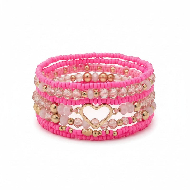 Chic Collective Pink Heart Stack bracelet set with gold accents and clear pink beads.