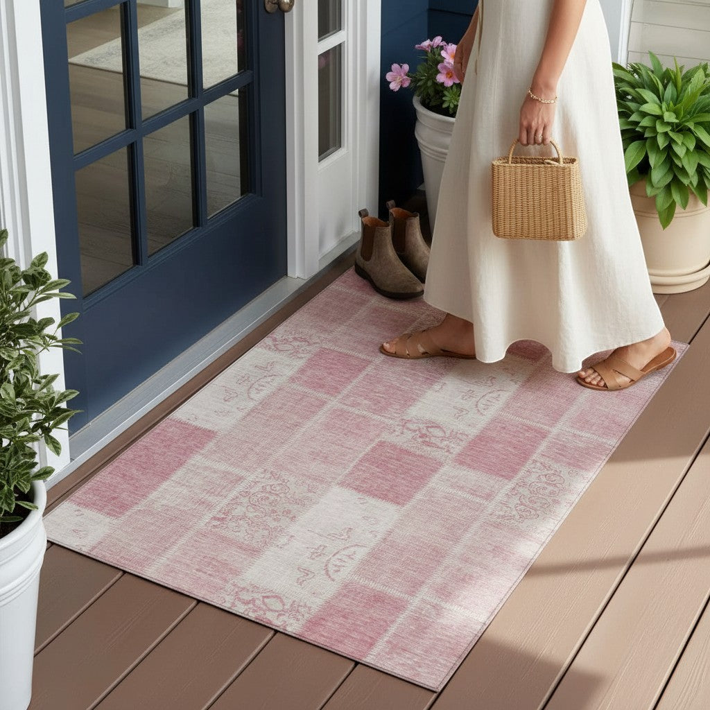 Chic Collective 3'x5' pink blush and ivory patchwork indoor outdoor area rug with a distressed damask pattern. Rectangular polyester rug for entryway or patio.