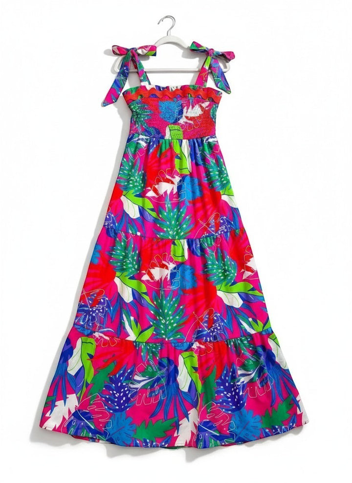 Chic Collective pink tiered tropical print maxi dress with smocked bodice and tie straps.