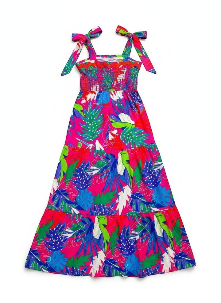 Chic Collective hot pink tiered maxi dress with tropical leaf print, smocked bodice, and tie-shoulder straps.