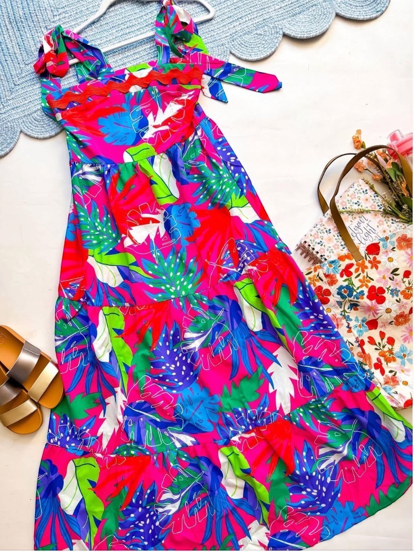 Chic Collective hot pink tiered maxi dress with tropical leaf print, smocked bodice, and tie-shoulder straps.