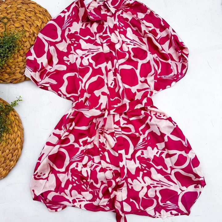 Chic Collective pink and white abstract floral print satin mini dress with short sleeves and a tie waist.