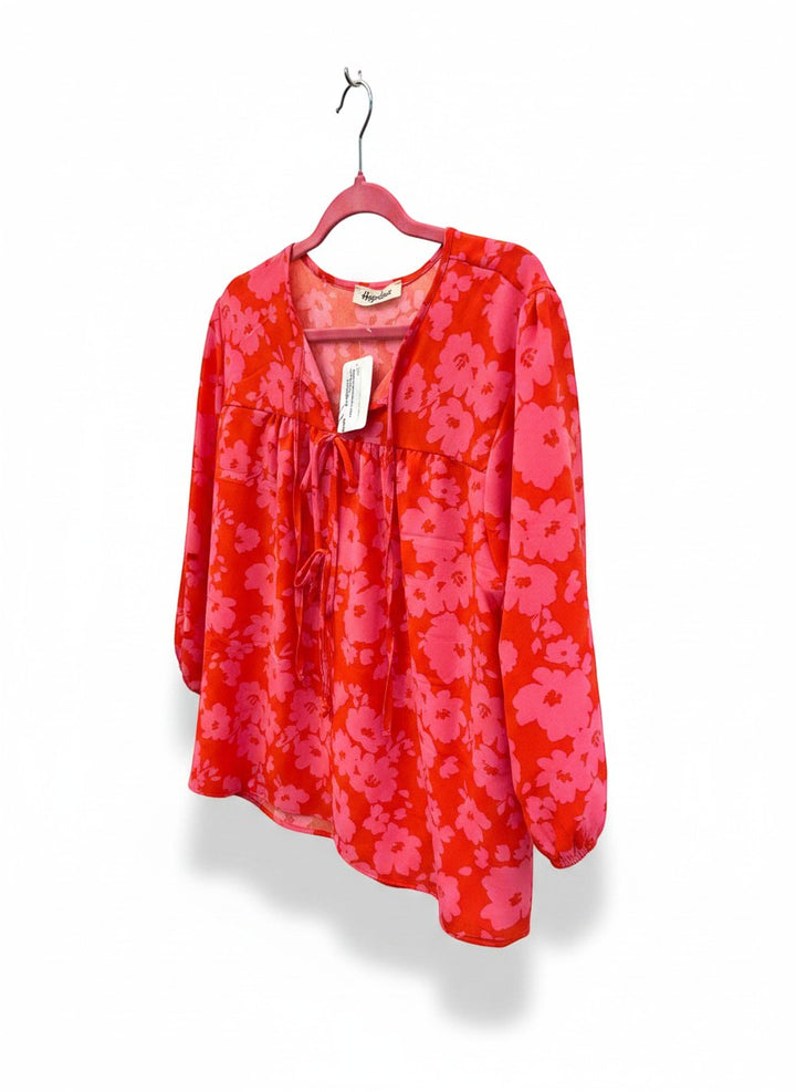 Chic Collective red and pink floral print tie-neck blouse with 3/4 sleeves.