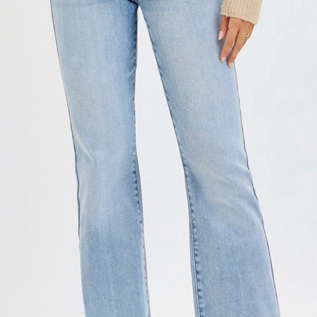 Chic Collective Risen Mid Rise Frayed light wash denim jeans with a slight flare and frayed hem, size 15.