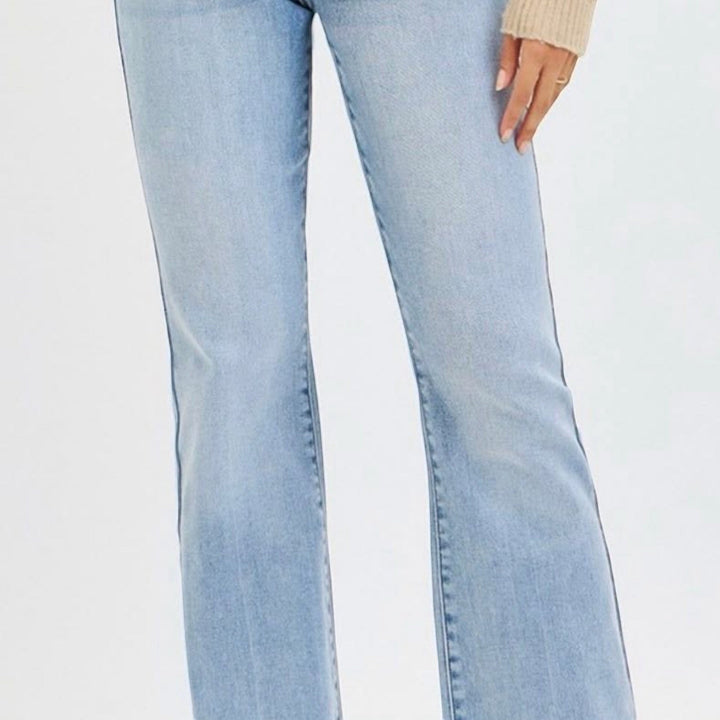 Chic Collective Risen Mid Rise Frayed light wash denim jeans with a slight flare and frayed hem, size 15.