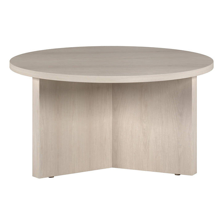 Chic Collective 32-inch round coffee table in light wood finish with a modern, minimalist design.