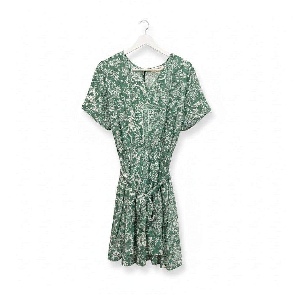 Chic Collective sage green boho surplice romper with white paisley print, short sleeves, tie waist, and pockets.
