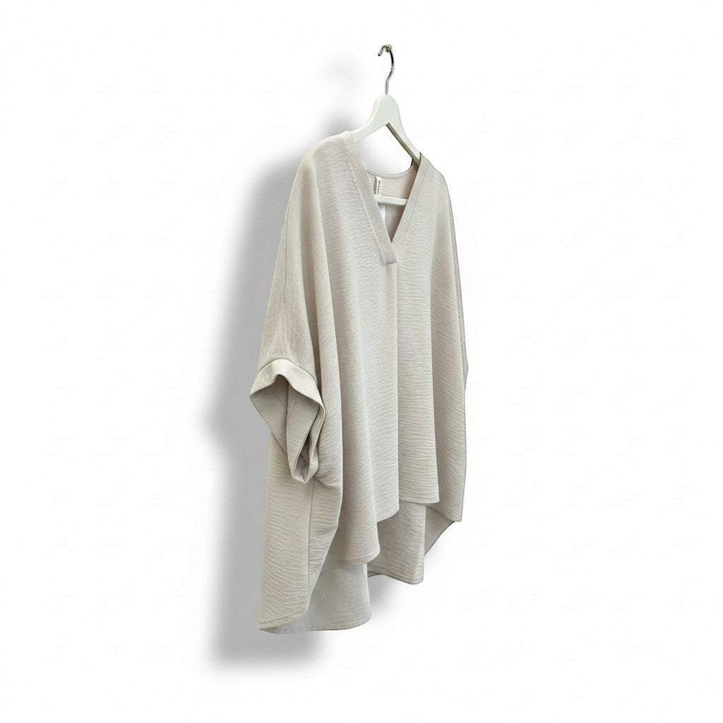 Chic Collective sand beige woven airflow v-neck top with puff half sleeves and a flowing hem.