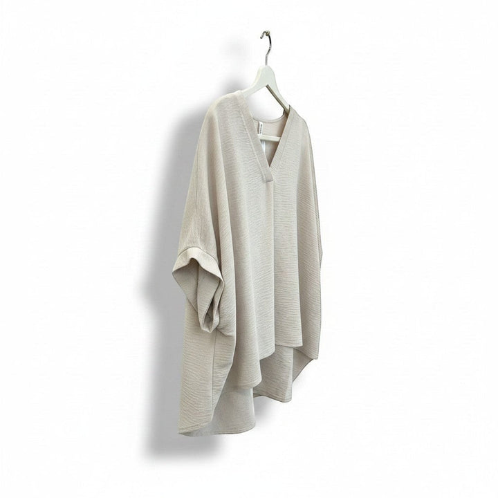 Chic Collective sand beige woven airflow v-neck top with puff half sleeves and a flowing hem.