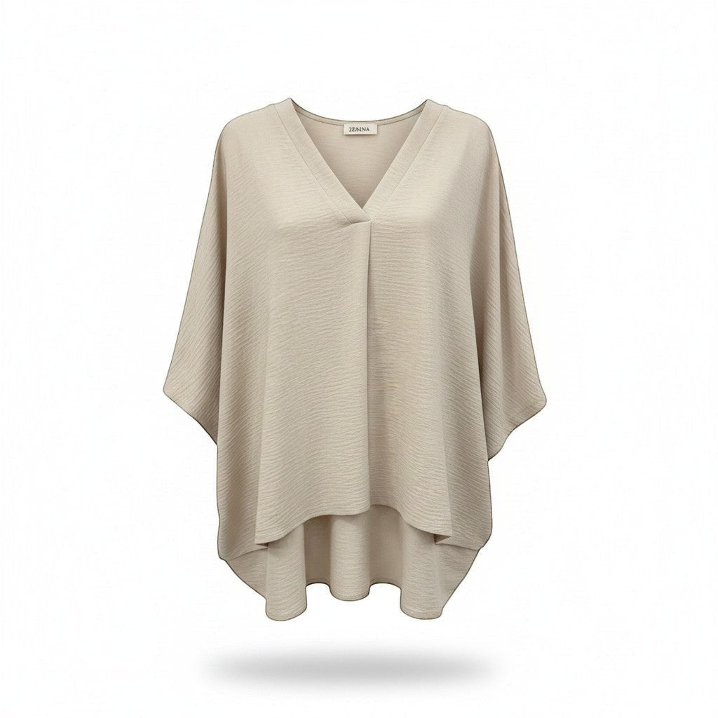 Chic Collective sand beige woven airflow V-neck top with puff half sleeves and a high-low hem.