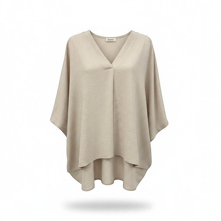 Chic Collective sand beige woven airflow V-neck top with puff half sleeves and a high-low hem.
