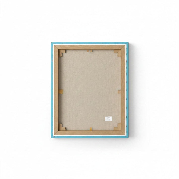 Chic Collective Sunset Reverie custom artwork, framed canvas with light blue border and wooden stretcher bars.