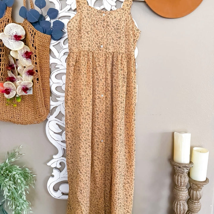 Chic Collective tan floral print maxi dress with button front and adjustable straps.