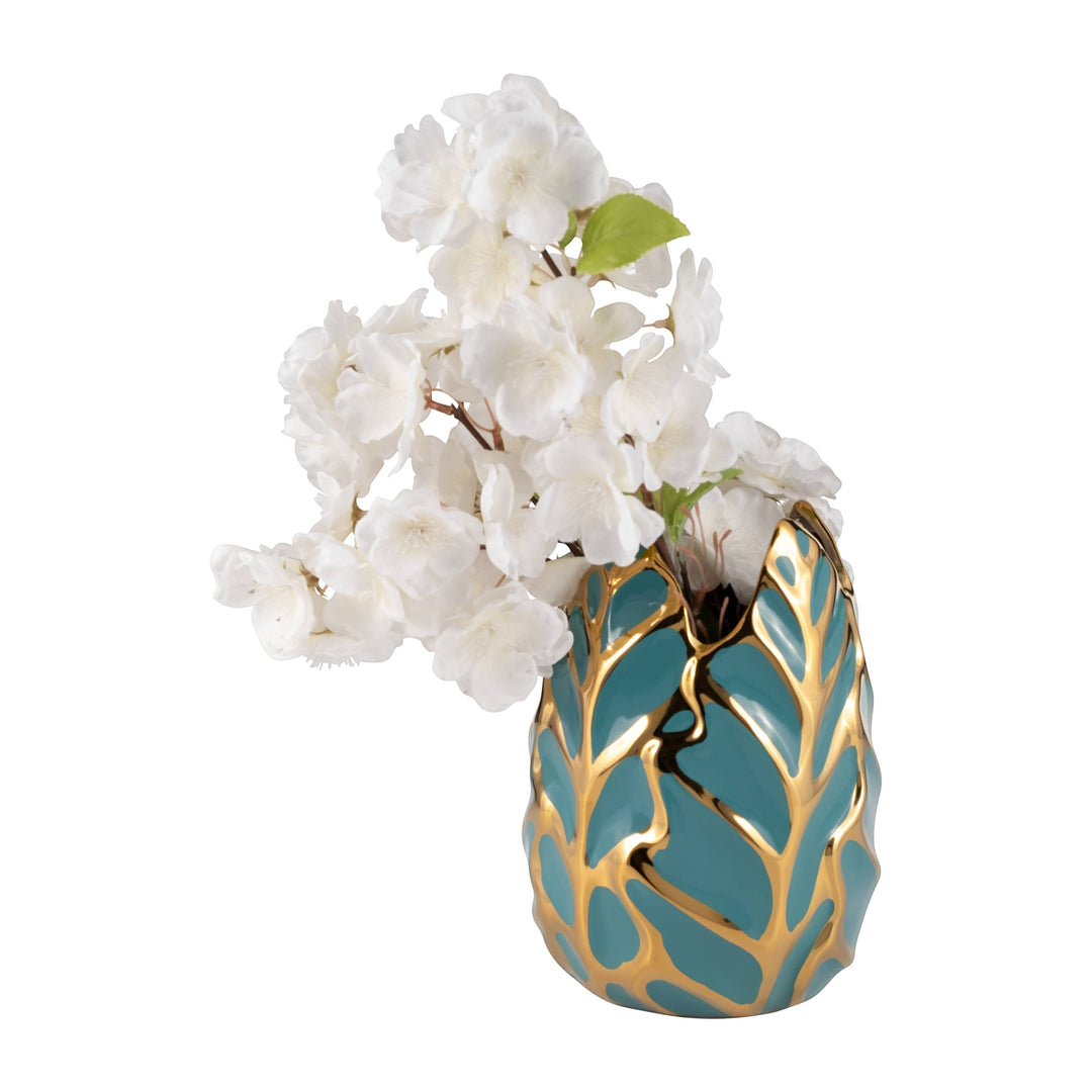 Chic Collective teal stoneware vase with gold leaf design, holding white faux cherry blossoms.