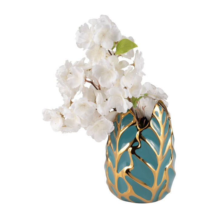 Chic Collective teal stoneware vase with gold leaf design, holding white faux cherry blossoms.