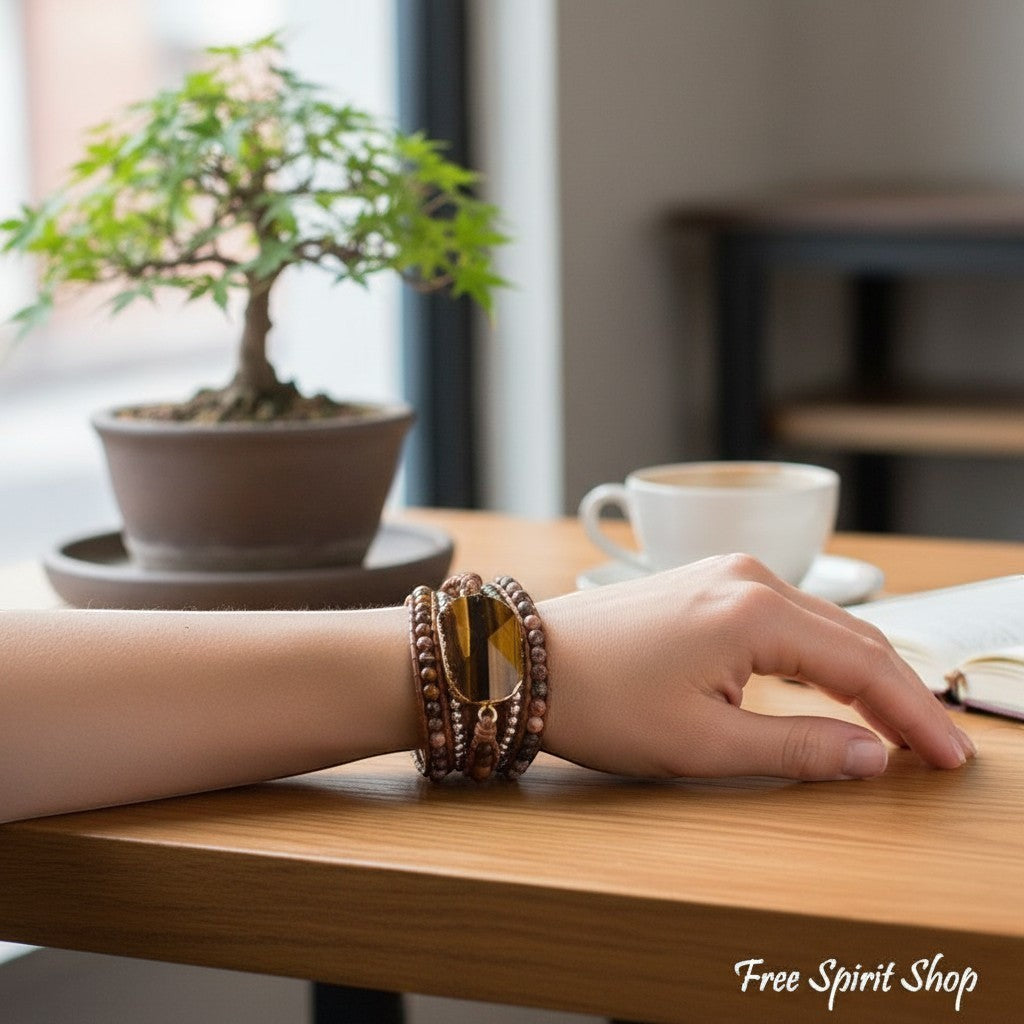 Chic Collective natural tiger eye and jasper beaded wrap bracelet on genuine leather with stainless steel accents.