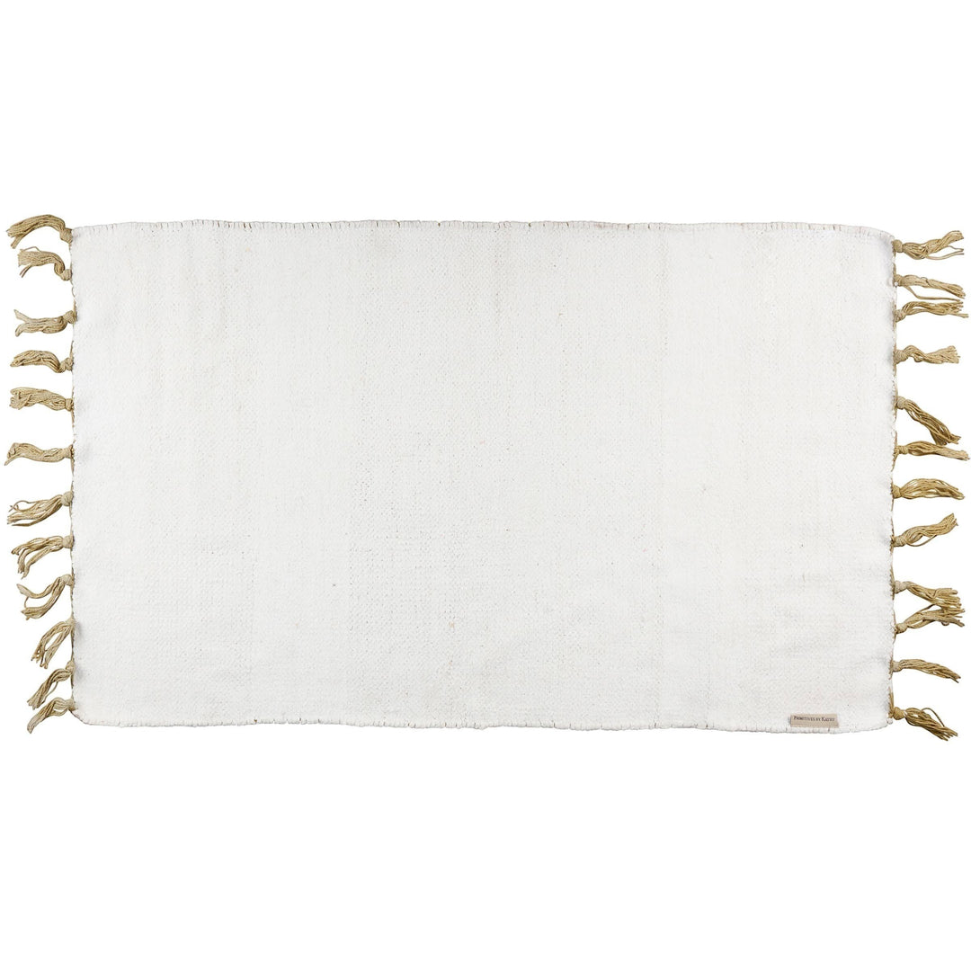 Chic Collective white cotton chenille rug with tassels and a delicate watercolor floral design. Suitable for indoor/outdoor use.