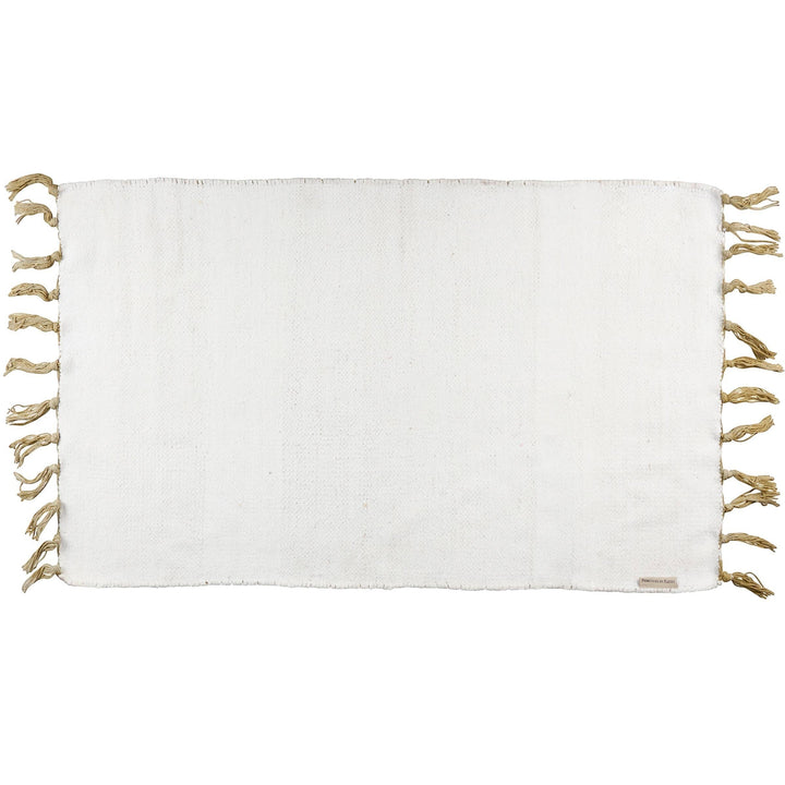 Chic Collective white cotton chenille rug with tassels and a delicate watercolor floral design. Suitable for indoor/outdoor use.
