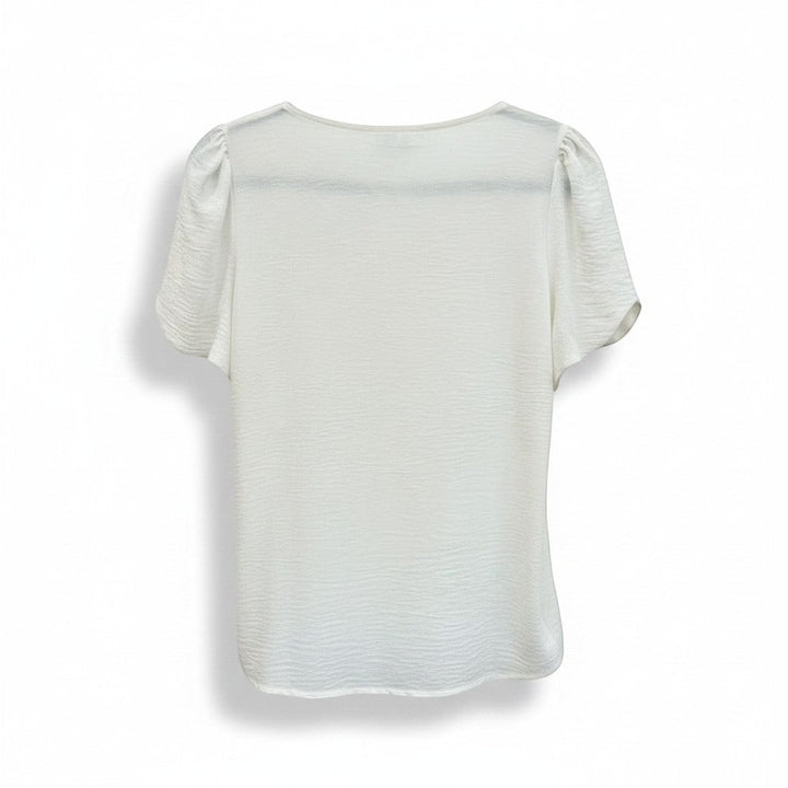 Chic Collective white ivory woven blouse with short puffed sleeves and a textured finish.