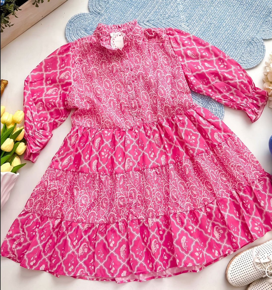 Chic Collective pink and white tiered midi dress with a paisley print, high neckline, and long puff sleeves.